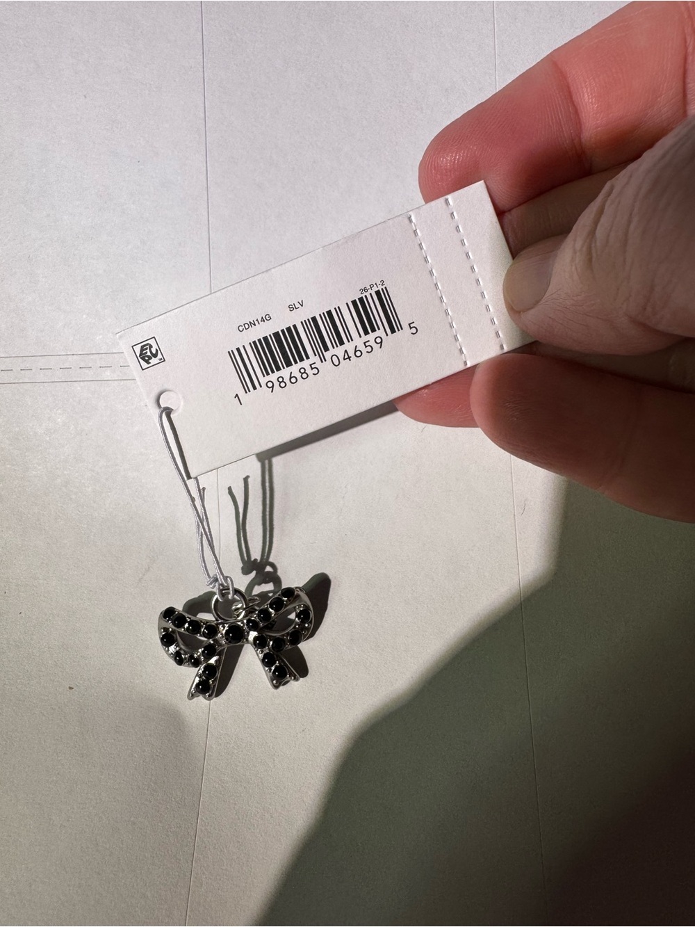 Coach Silver Bow Charm with Black Rhinestone charm bracelet, necklace, shoelace